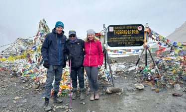 RM Treks' Clients with our guide Uttar at Thorong La Pass - Classic Annapurna Circuit Trek