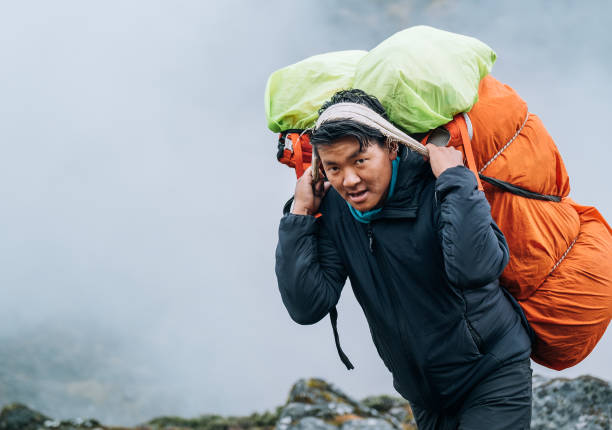 Porter Carrying Luggage During Nepal Trekking